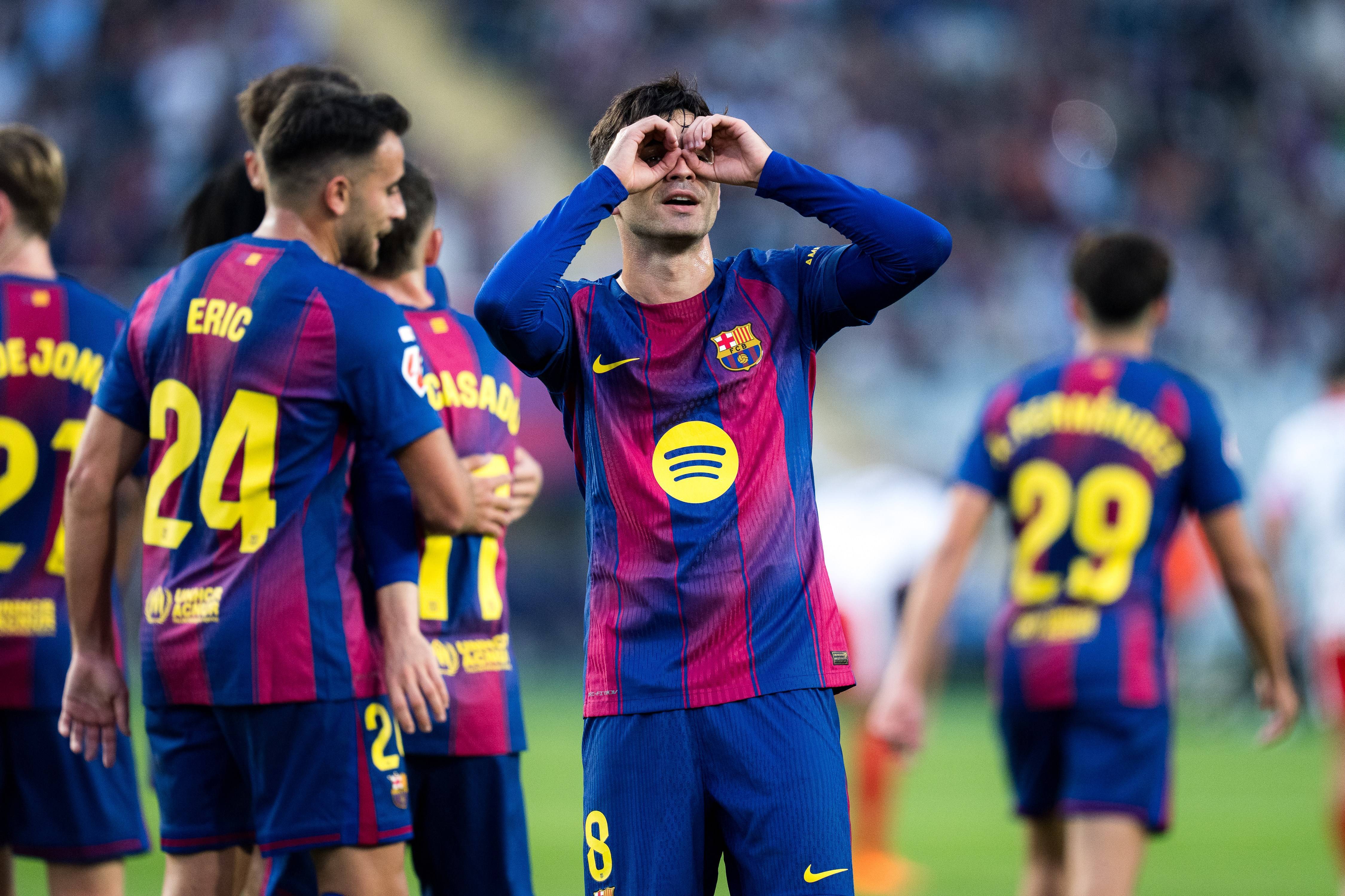 (体育)足球——西甲:巴塞罗那胜赫罗纳